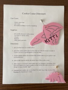 image of instructions for cookie cutter dinosaurs with two sample cookie cutter crafts