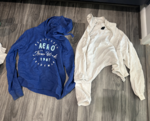 blue hoodie and white zip-up sweater